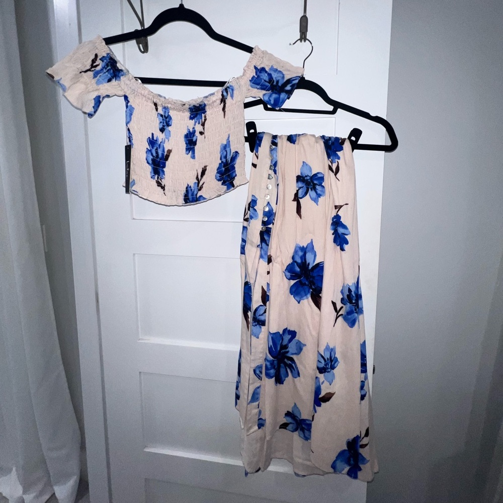 Lulus cute smocked top and botton down skirt. Excellent condition.